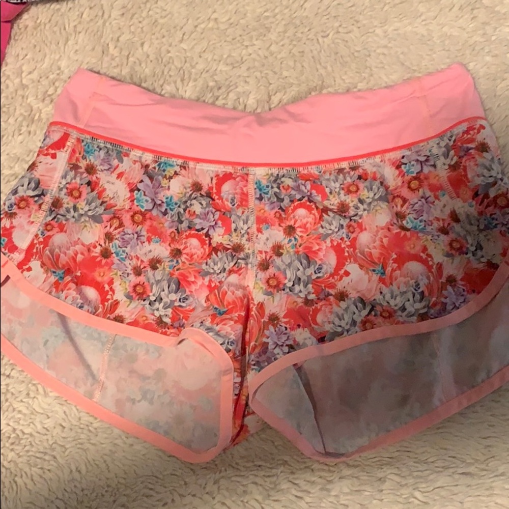 Pink floral printed lululemon shorts